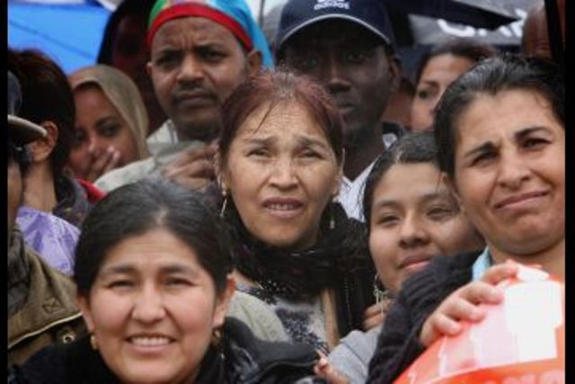 Women protesting discrimination against migrant workers in London